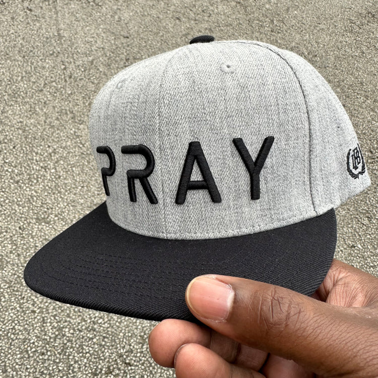 PRAY SnapBack Hat/Gray with Black. Contrast colour hat, black visor, and black top button. side view